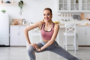 woman exercising in her home